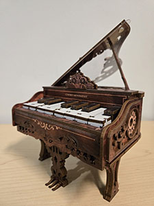 Item #4 Wooden Piano